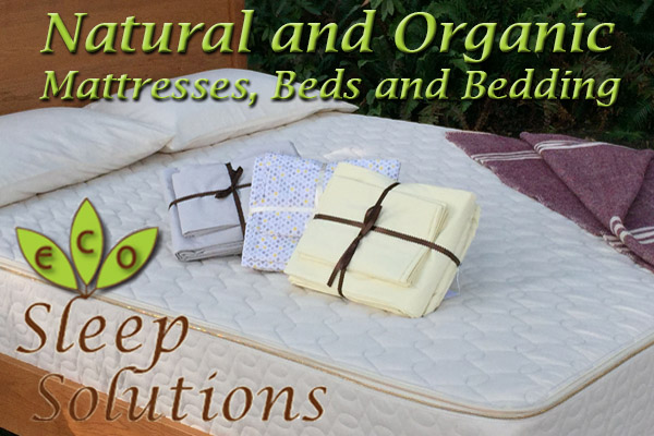 organic mattress with sets of sheets on top